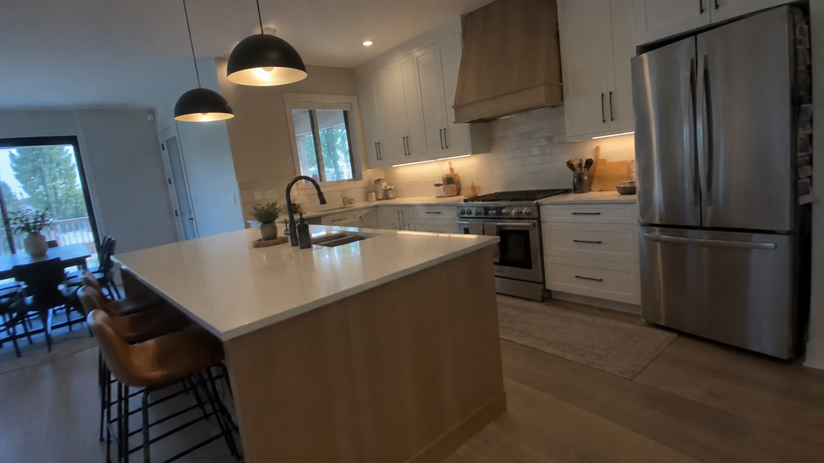 Same kitchen before: dim, tilted frame from the walkthrough video